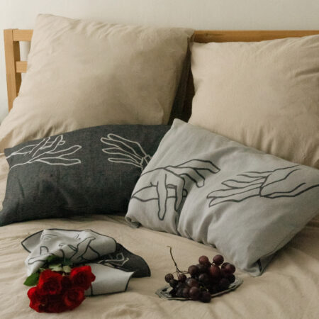 Housse de coussin Manos rectangulaire en jacquard · Noire