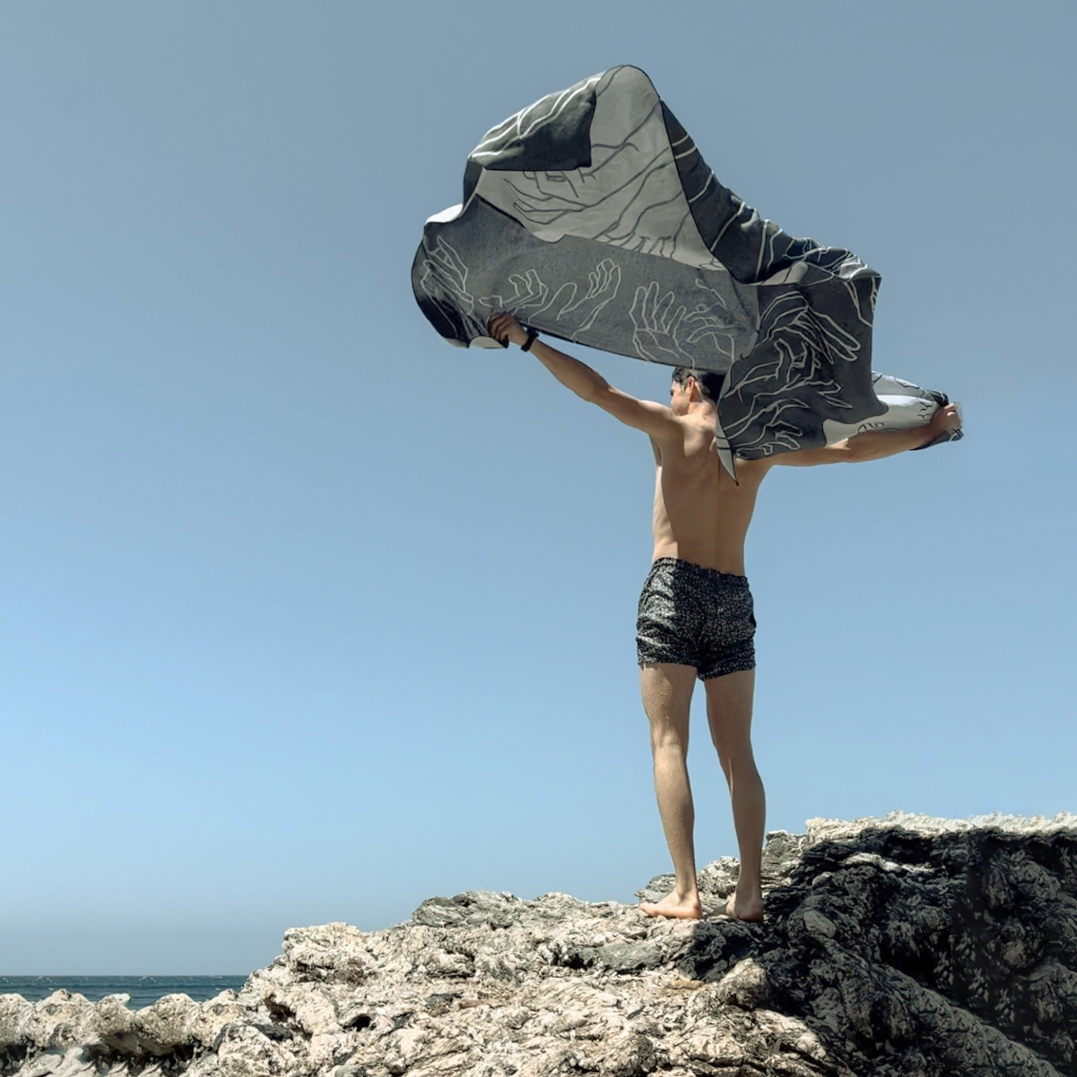 Serviette Manos réversible en jacquard 130 x 215 · Biais gris – Image 2